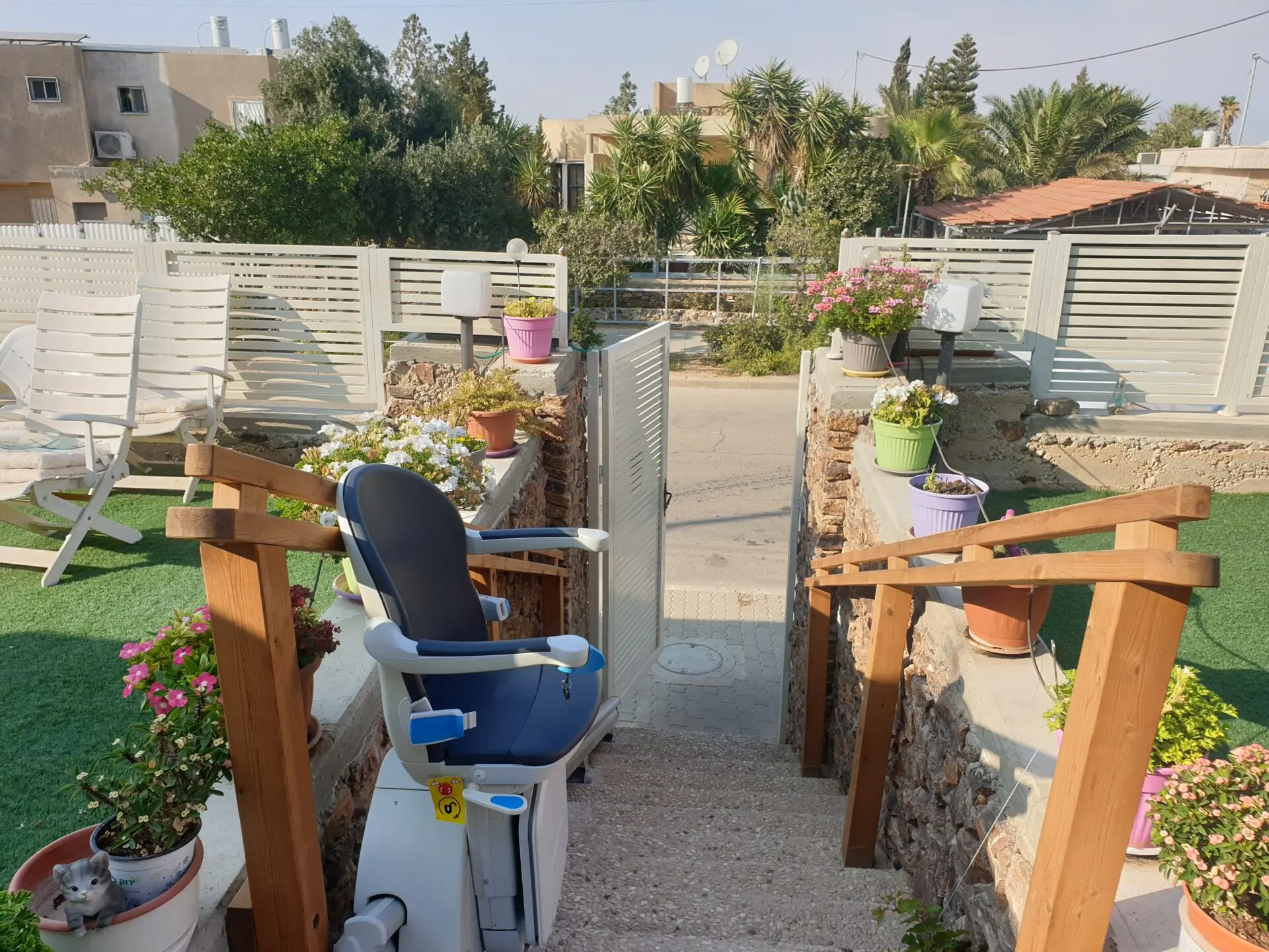 Outdoor stairlift in modern holiday home.