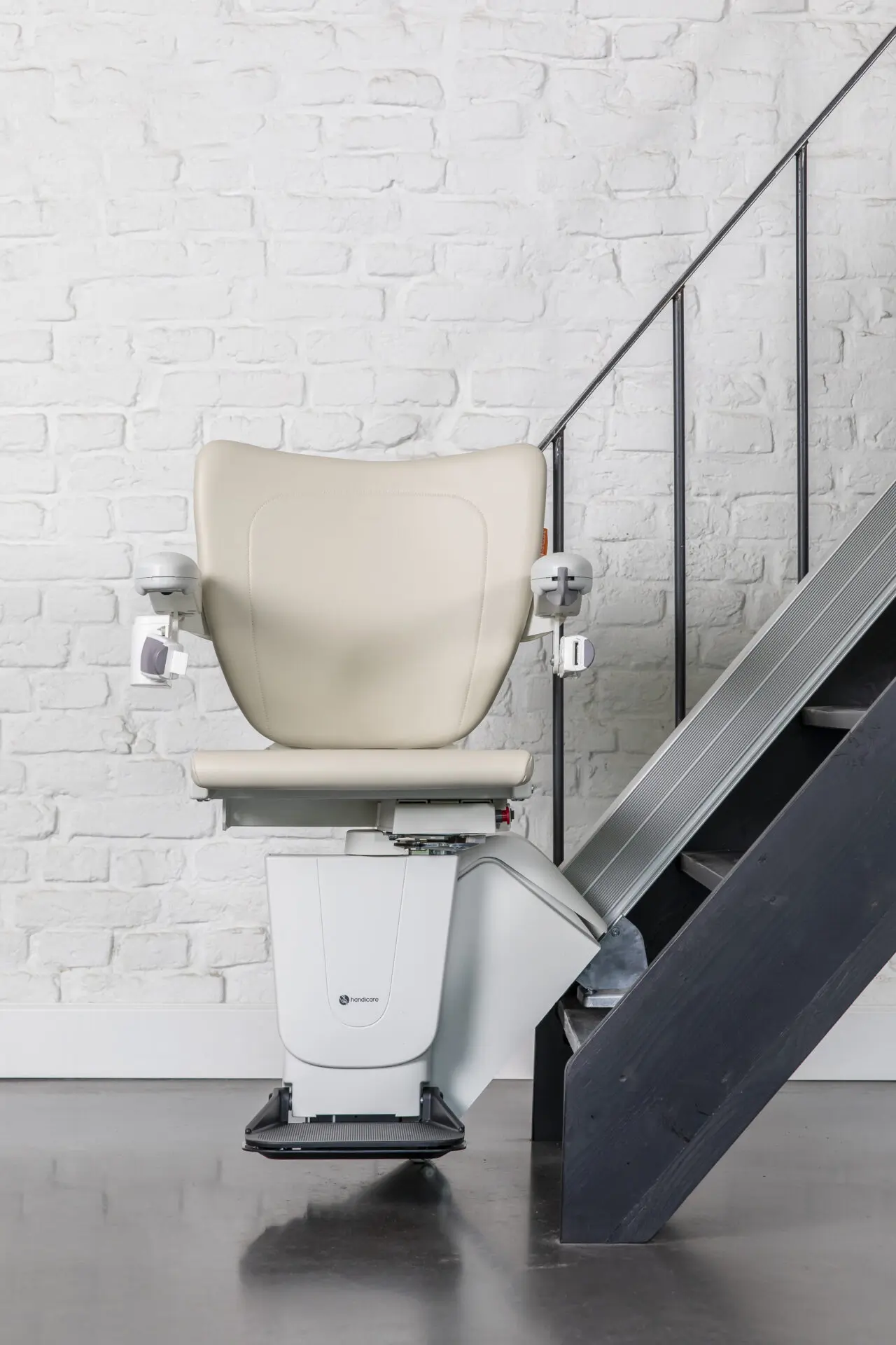 Handicare 1100 stylish stairlift in modern home.