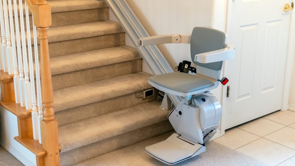 An electric motorized chair lift for persons with disabilities.