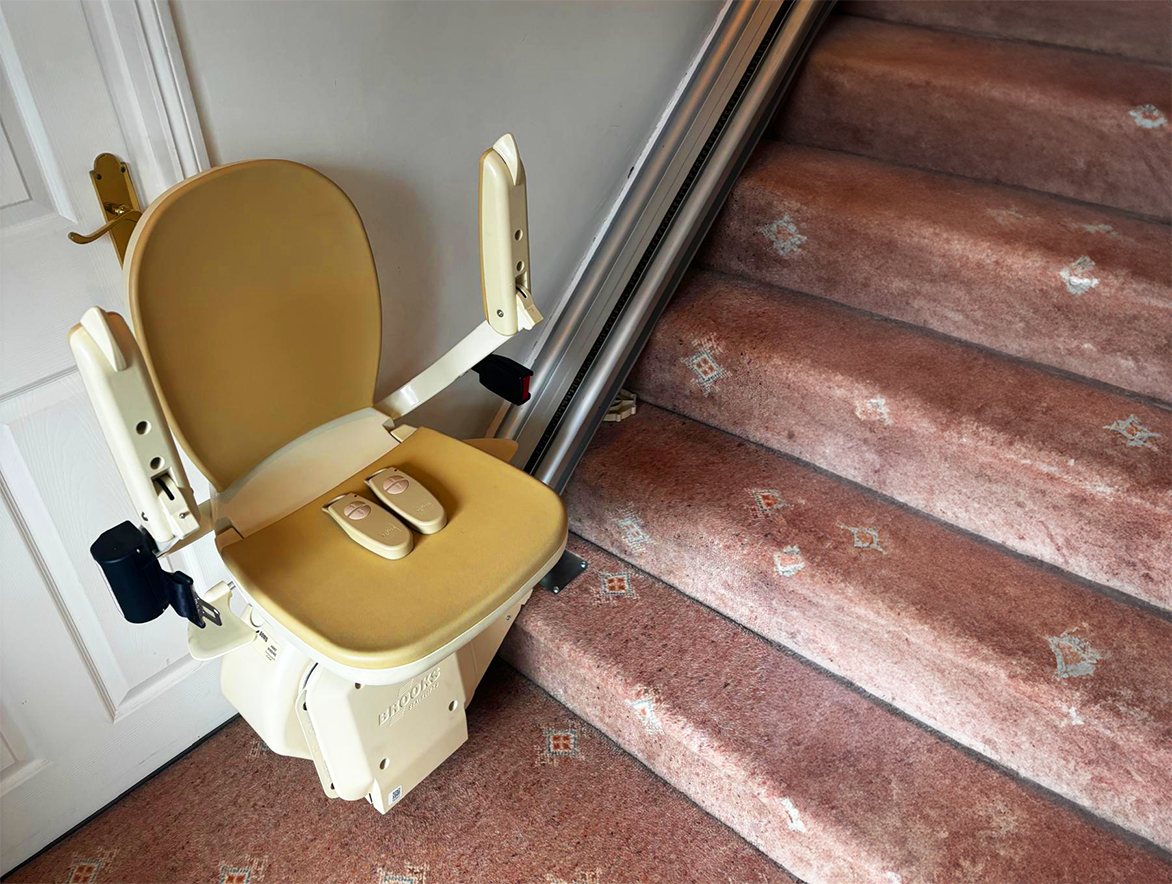 A Brooks 130 Stairlift installed neatly into a home by Senior Stairlifts.