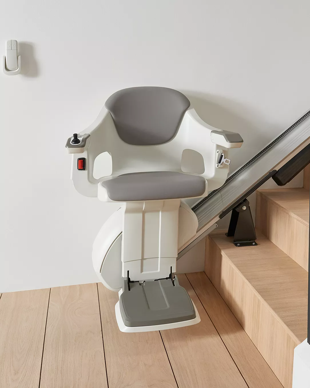 A homeglide straight stairlift neatly installed in a comfortable home.