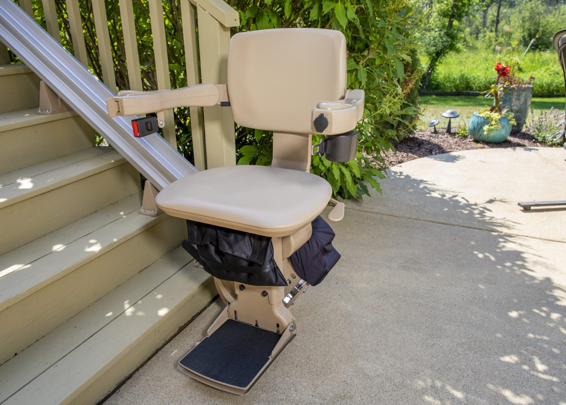 a bruno outdoor elite straight chair at the bottom of stairs