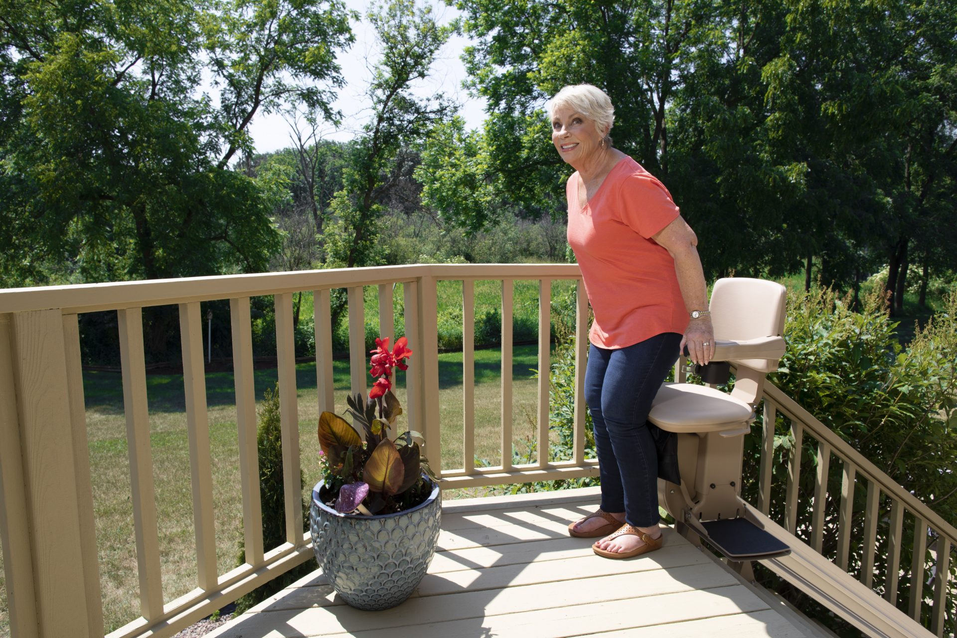 a lady standing up from her bruno outdoor elite