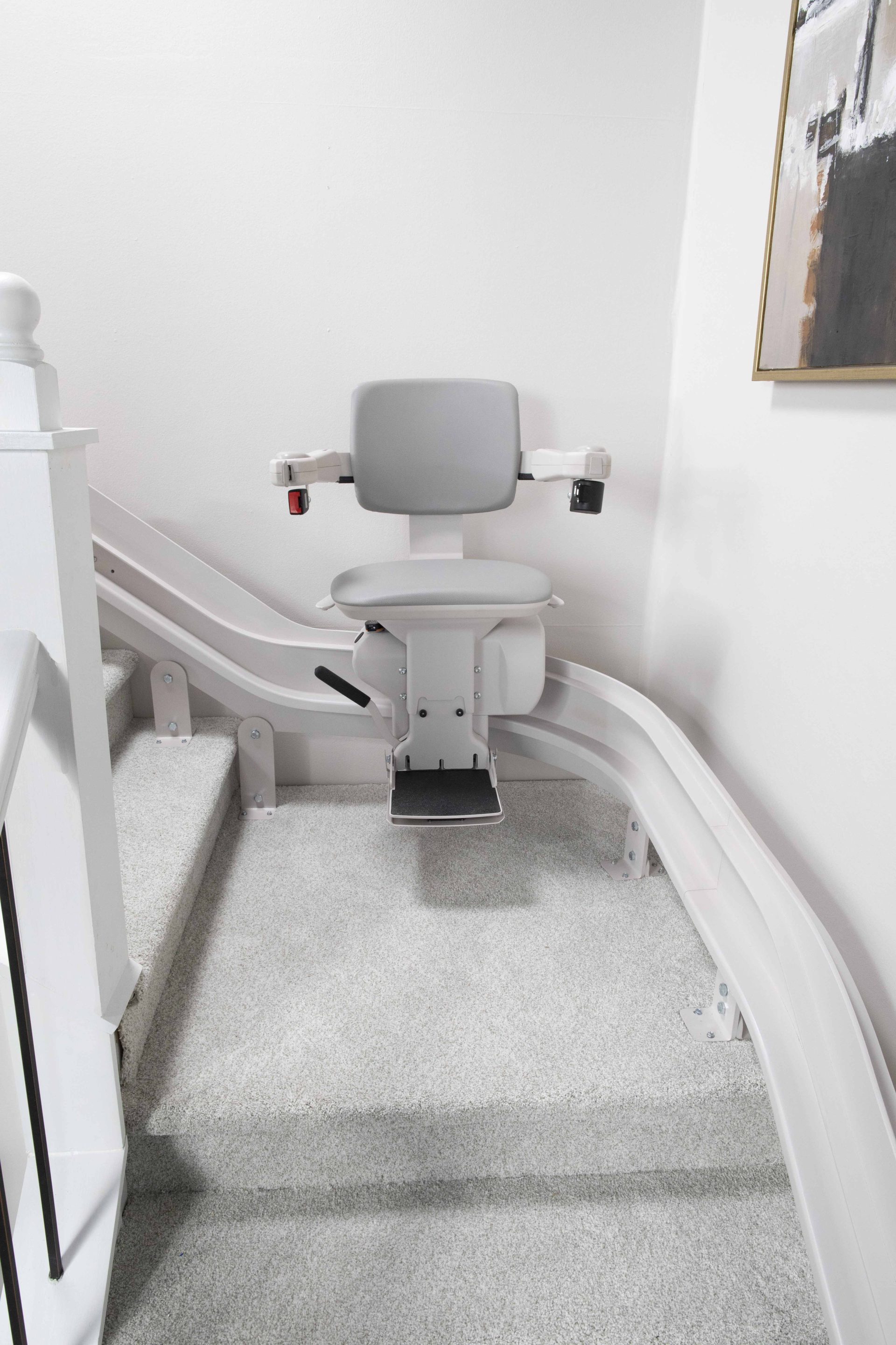 A bruno Elite curved stair lift in travel