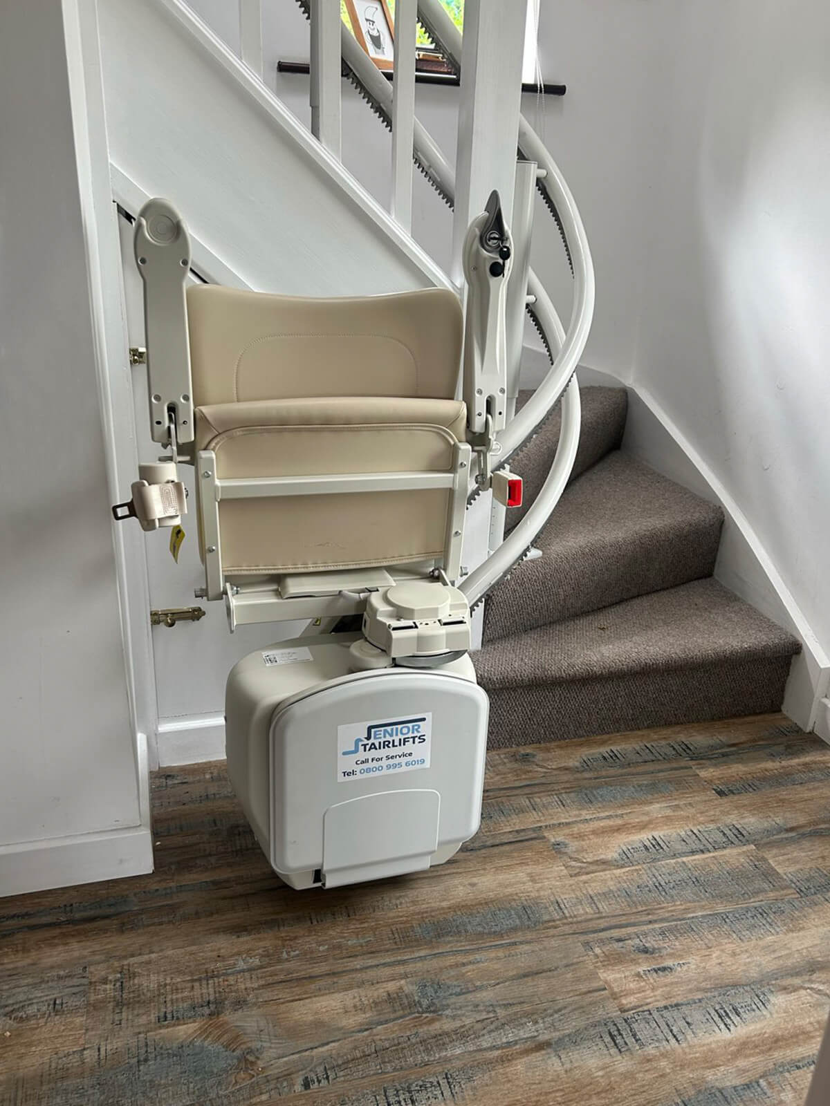 Curved stairlift fitted to a spiral staircase