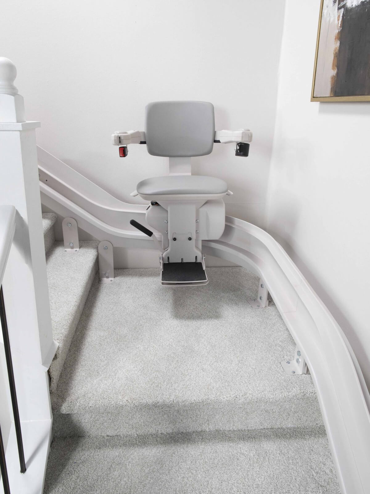 Bruno Elite heavy-duty stairlift fitted to a curved staircase