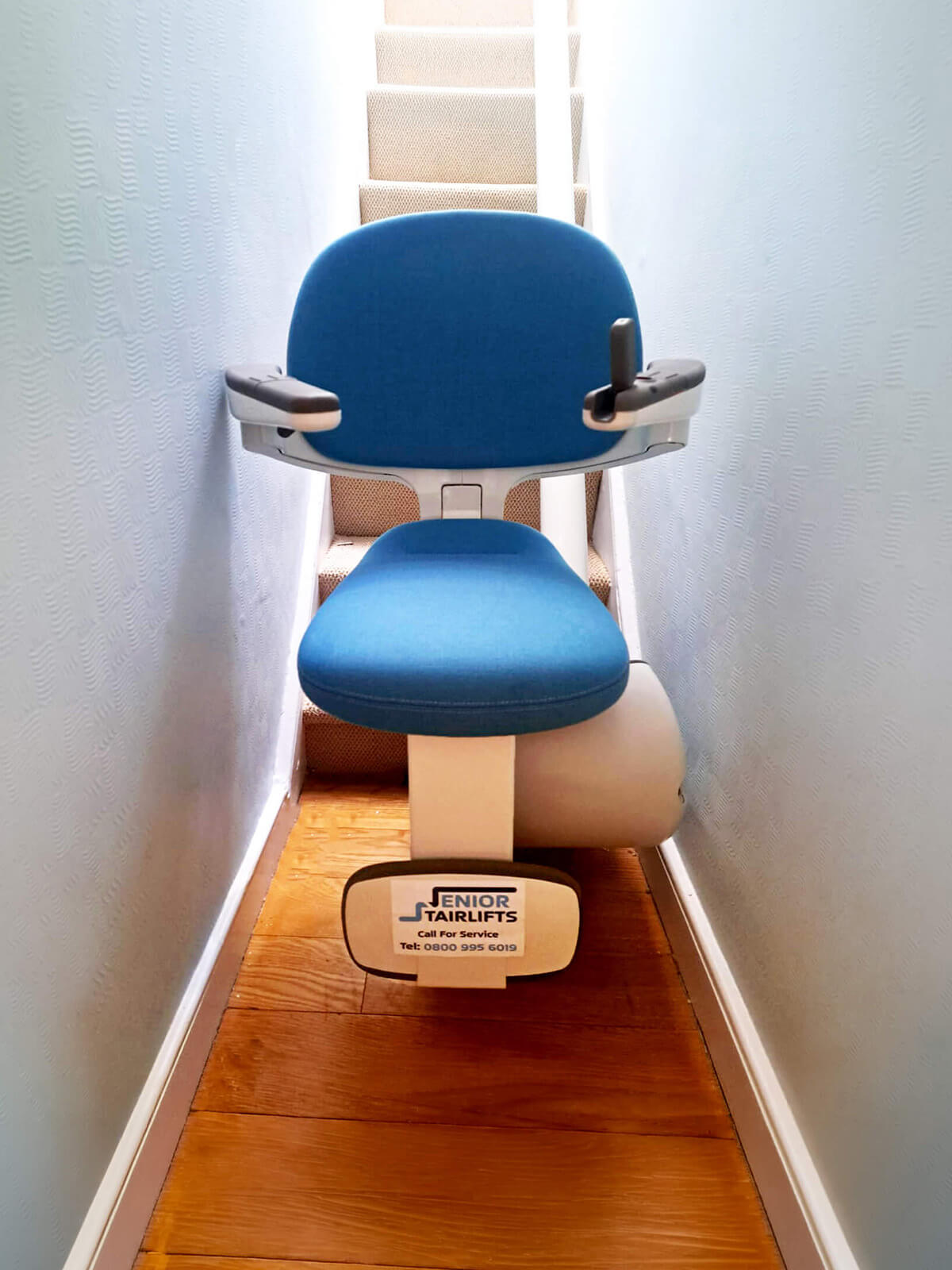 Narrow stairlift fitted on a tight staircase